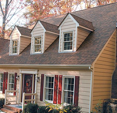 what color metal roof bkue house|reddish brown roof house colors.